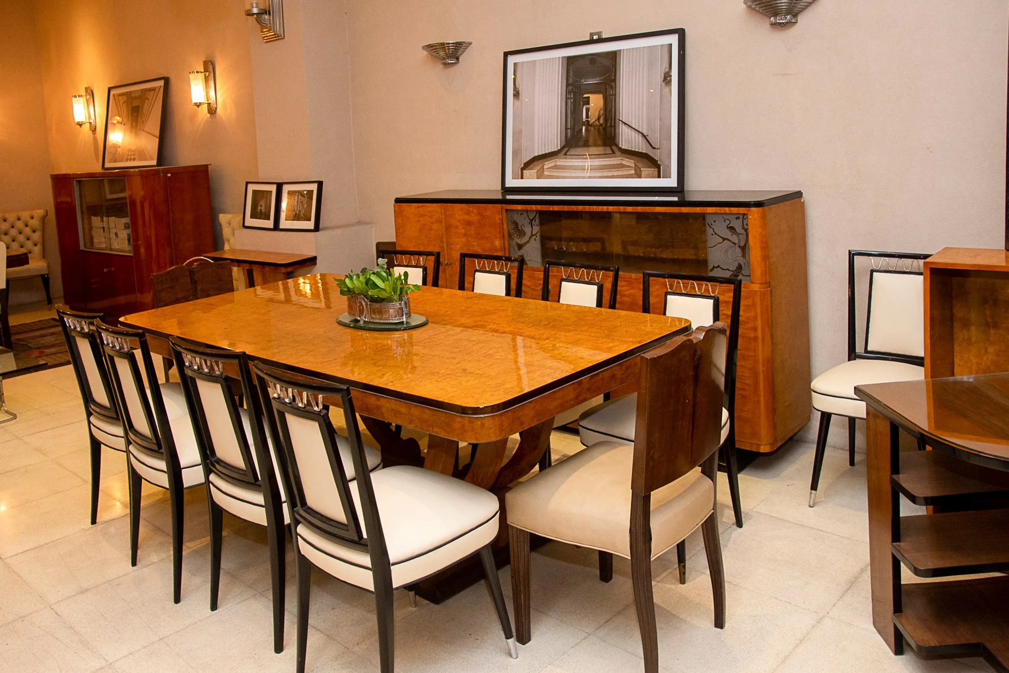 Room of Luxury Design Store with antique tables and chairs.