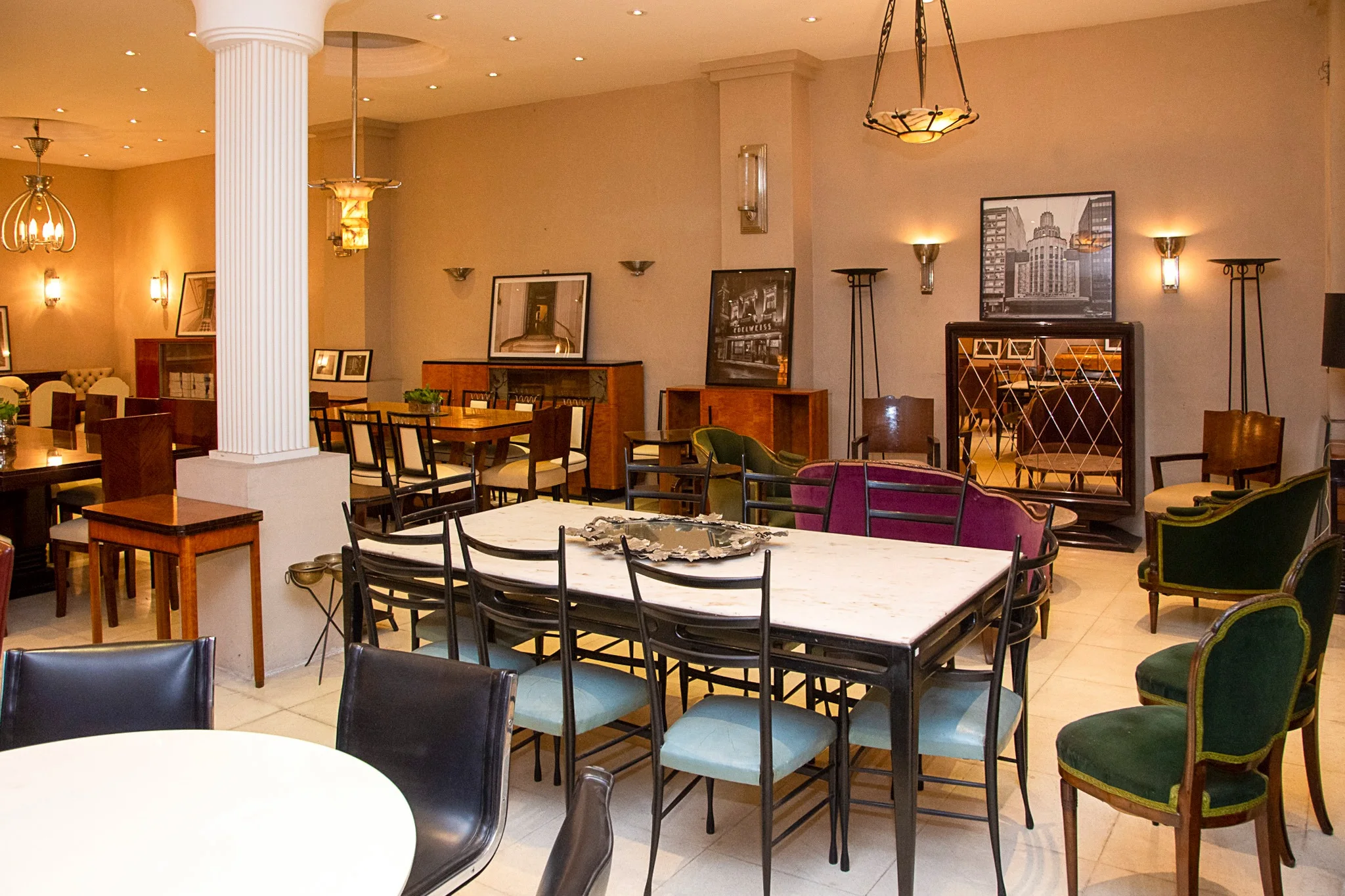 Interior of Luxury Design Store featuring antiques and vintage furniture.
