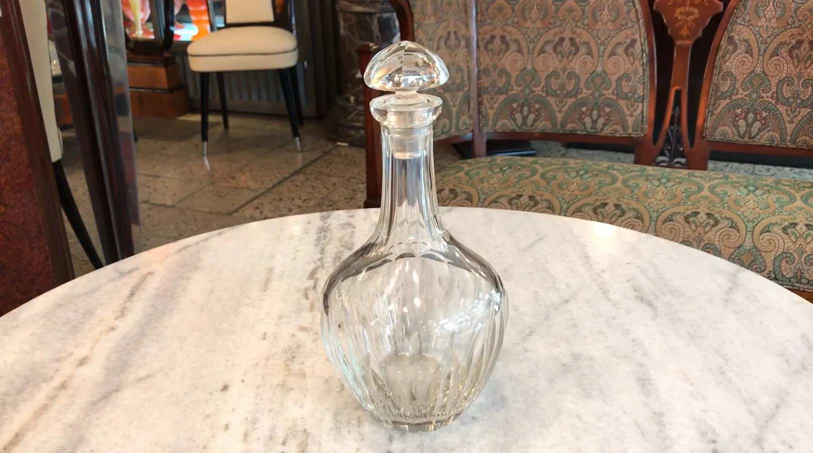 antique glass bottle on marble table