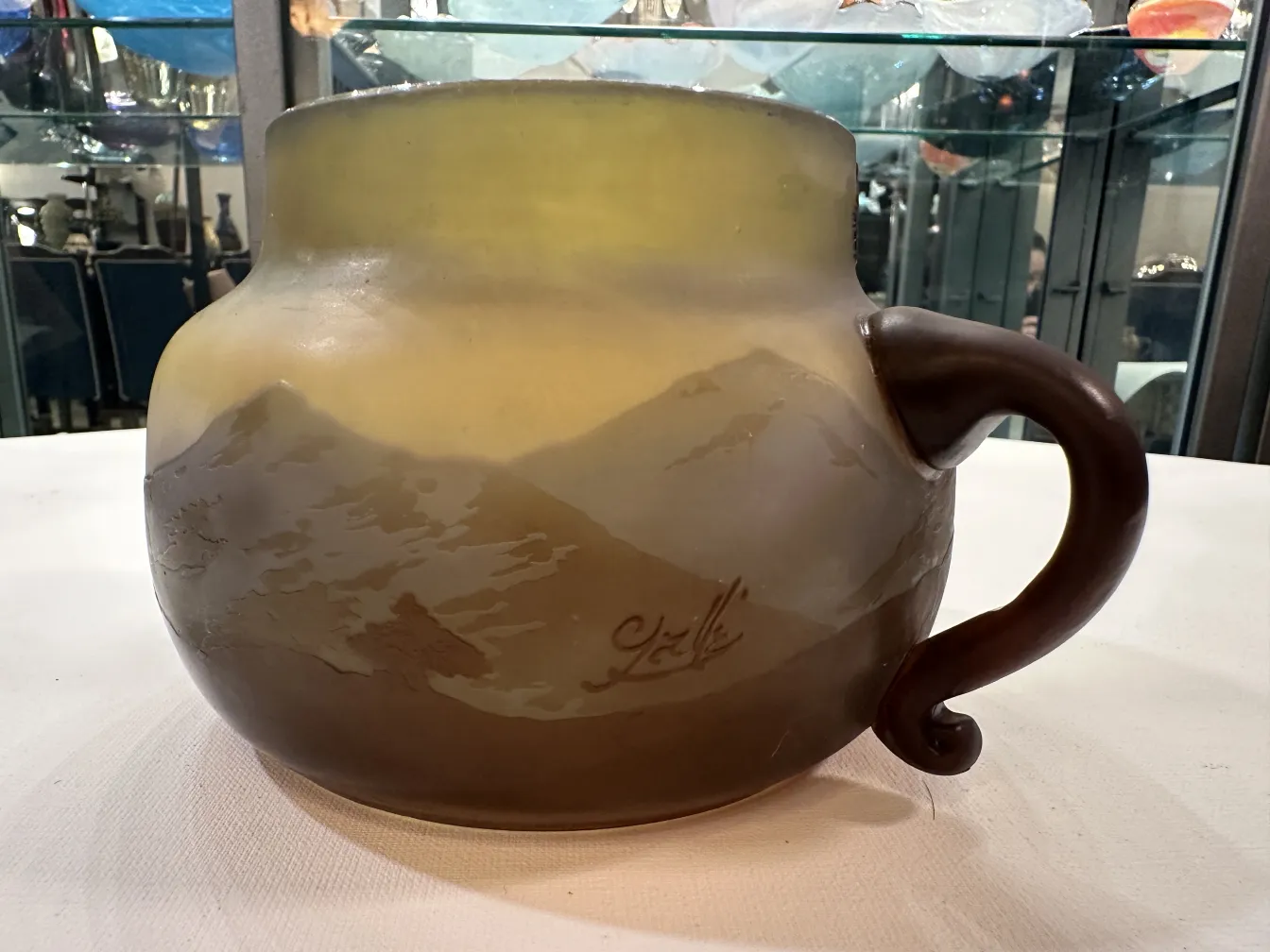 Antique signed glass Gallé, featuring natural landscapes