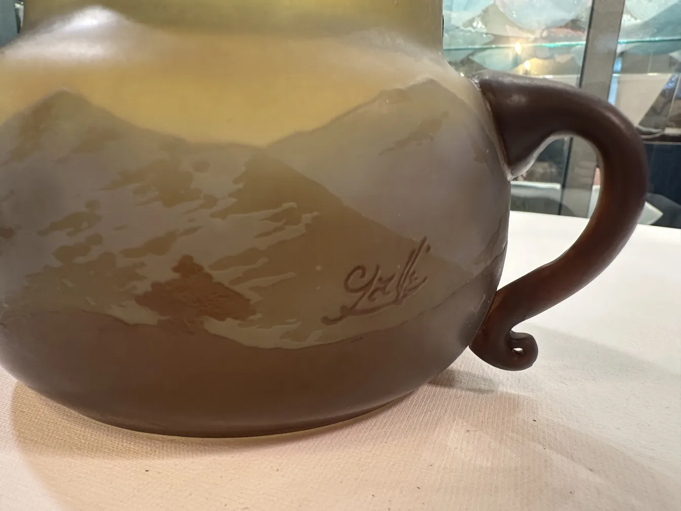 Antique signed glass Gallé, featuring natural landscapes