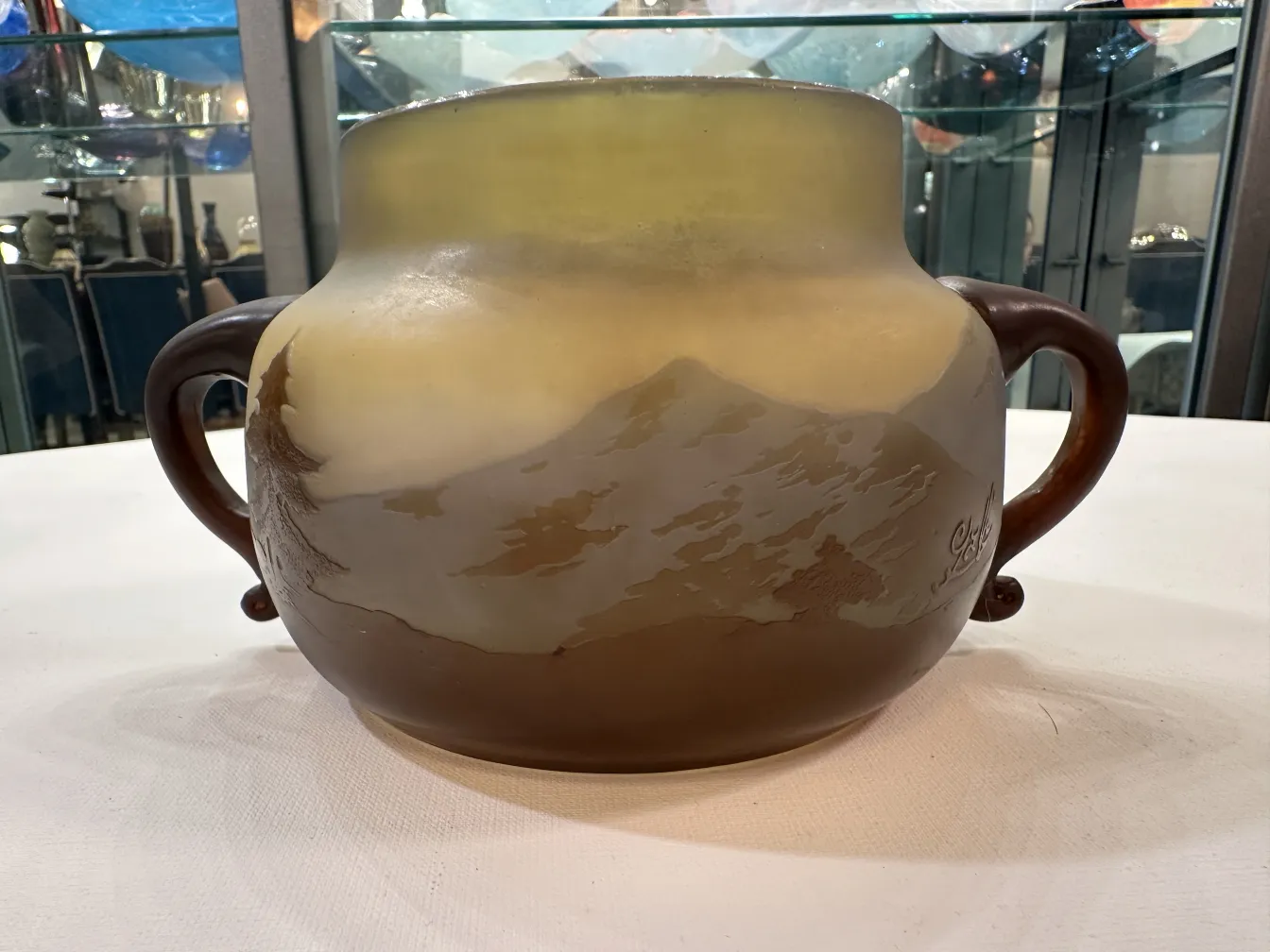 Antique signed glass Gallé, featuring natural landscapes