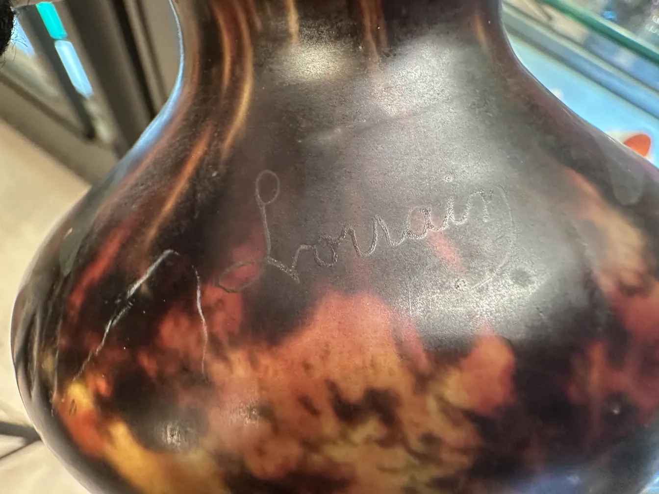 antique glass with Lorrain signature, dark tones, elegant shapes