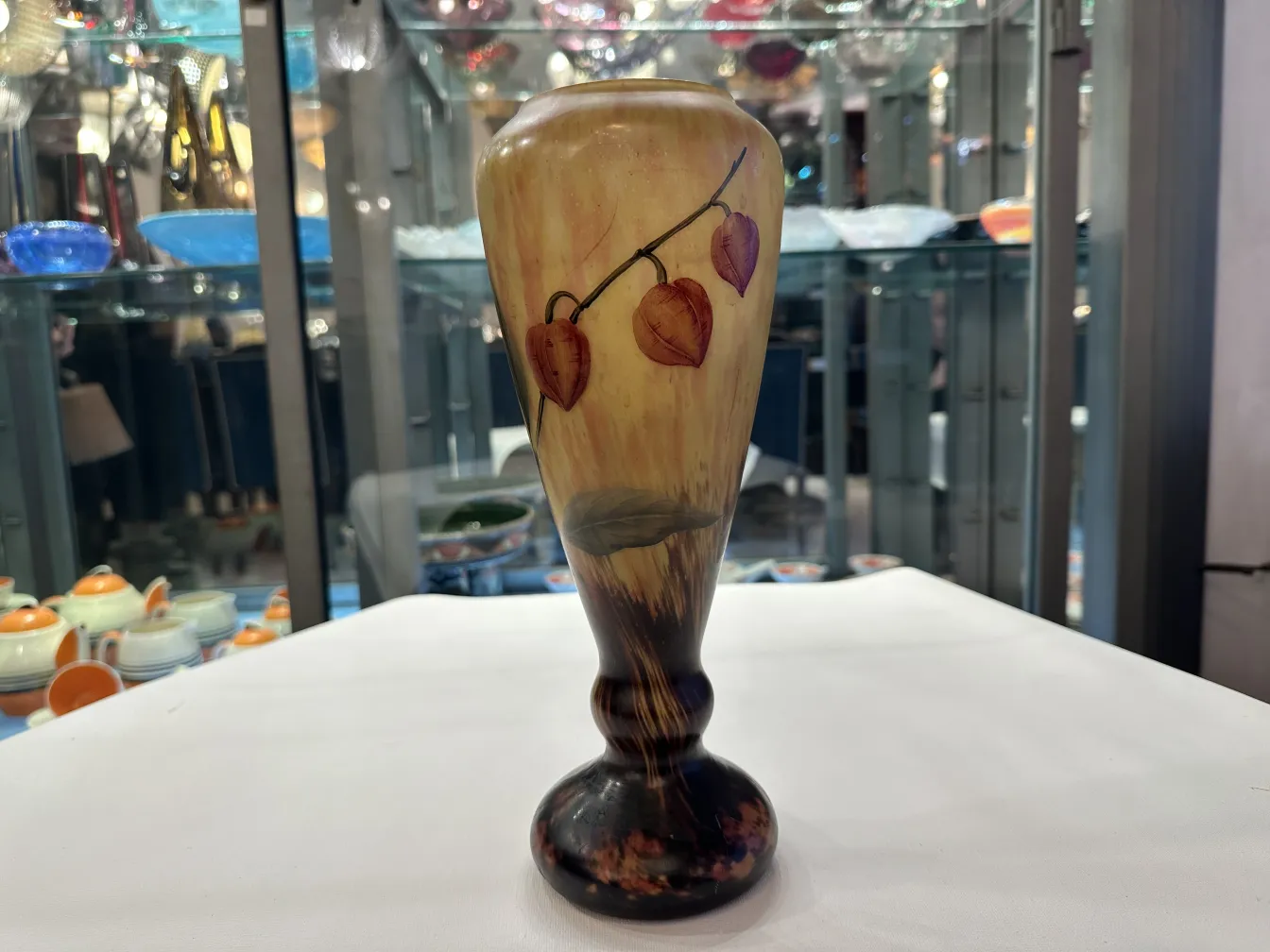 Signed glass Lorrain with leaf design in an antique setting