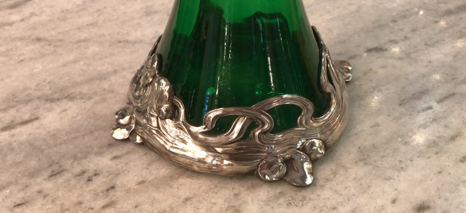 Close-up of 2 WMF jars with floral decorations on the lid
