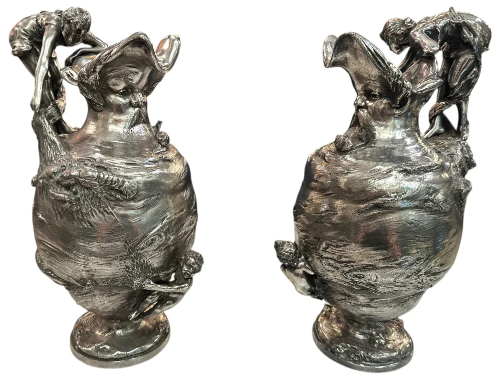 2 antique kayser jars embellished with figures