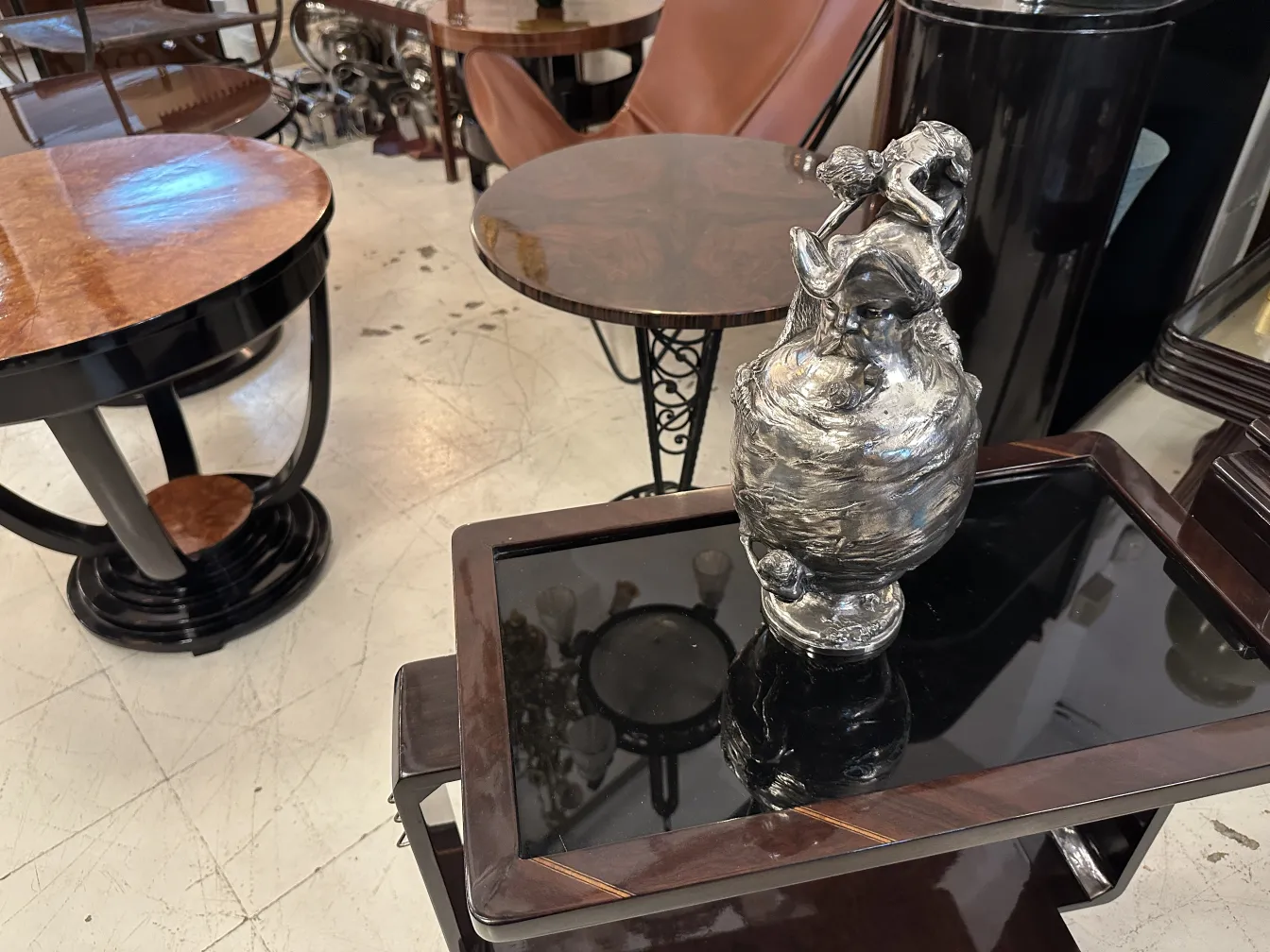 2 antique jars with elegant design in a cozy setting