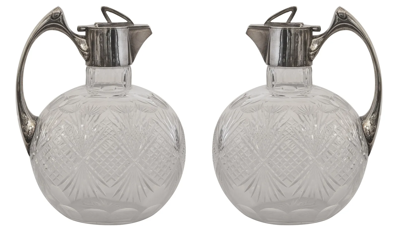 two elegant antique WMF jars in a classic setting