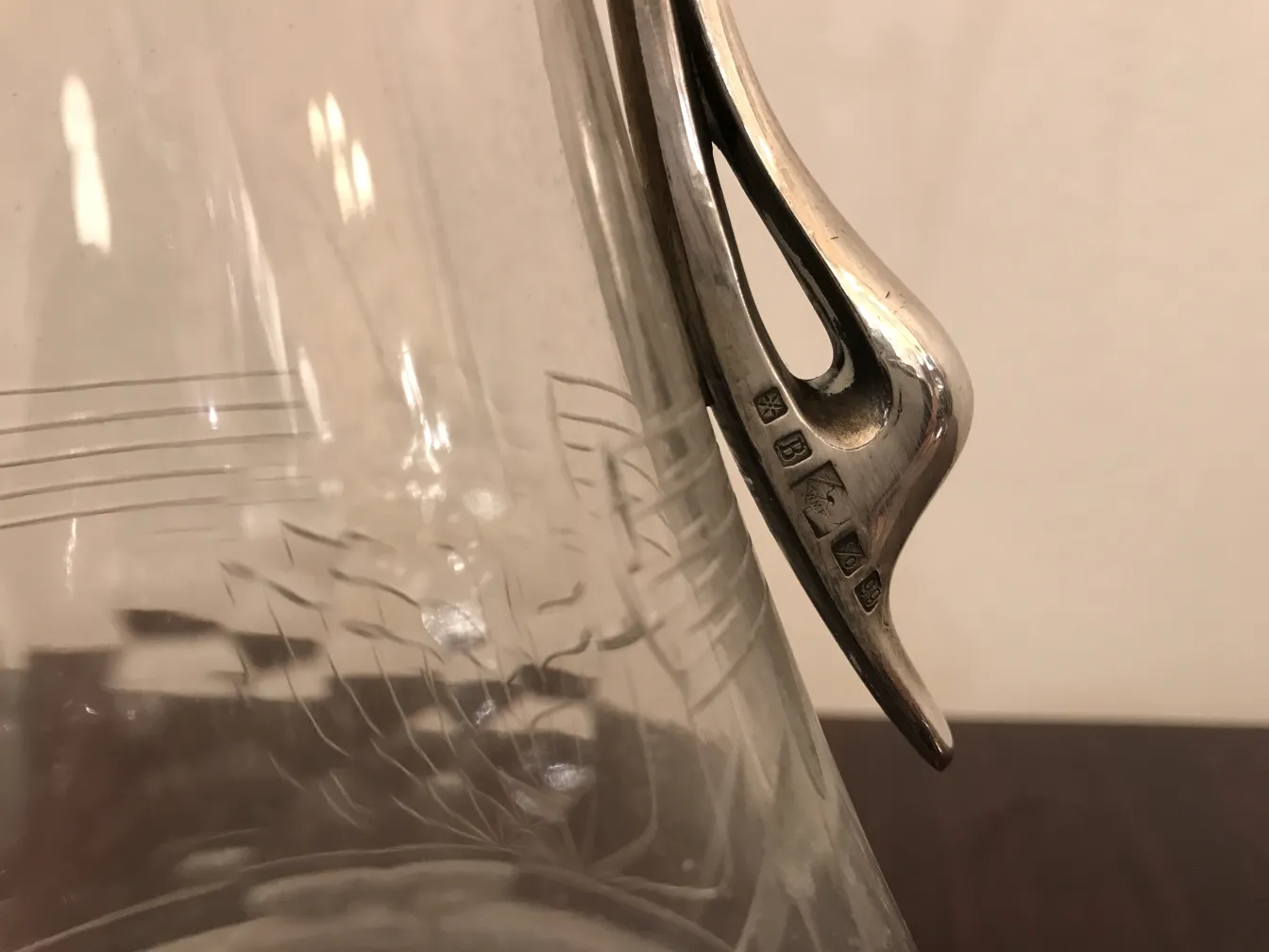 Antique jar with beautiful floral details in the design.