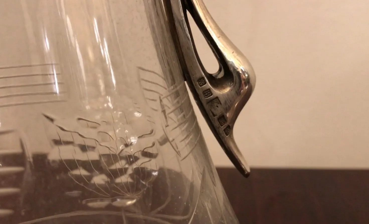 Antique jar with beautiful floral details in the design.