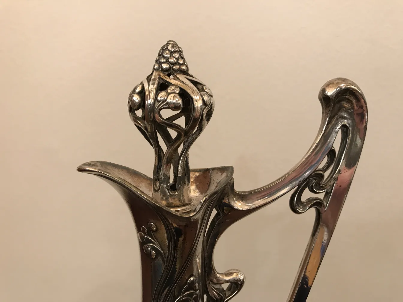 Antique jar with beautiful floral details in the design.