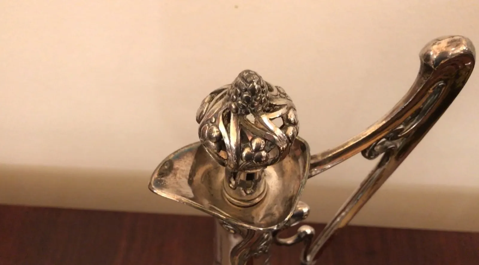 Antique jar with beautiful floral details in the design.