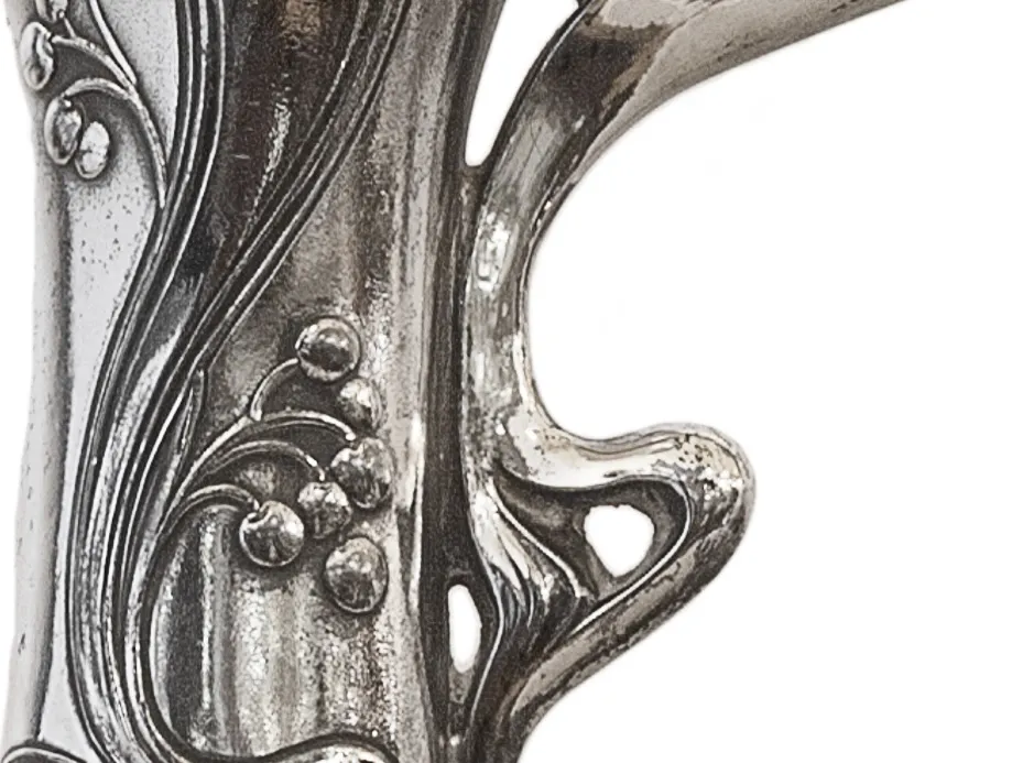 Antique jar with beautiful floral details in the design.