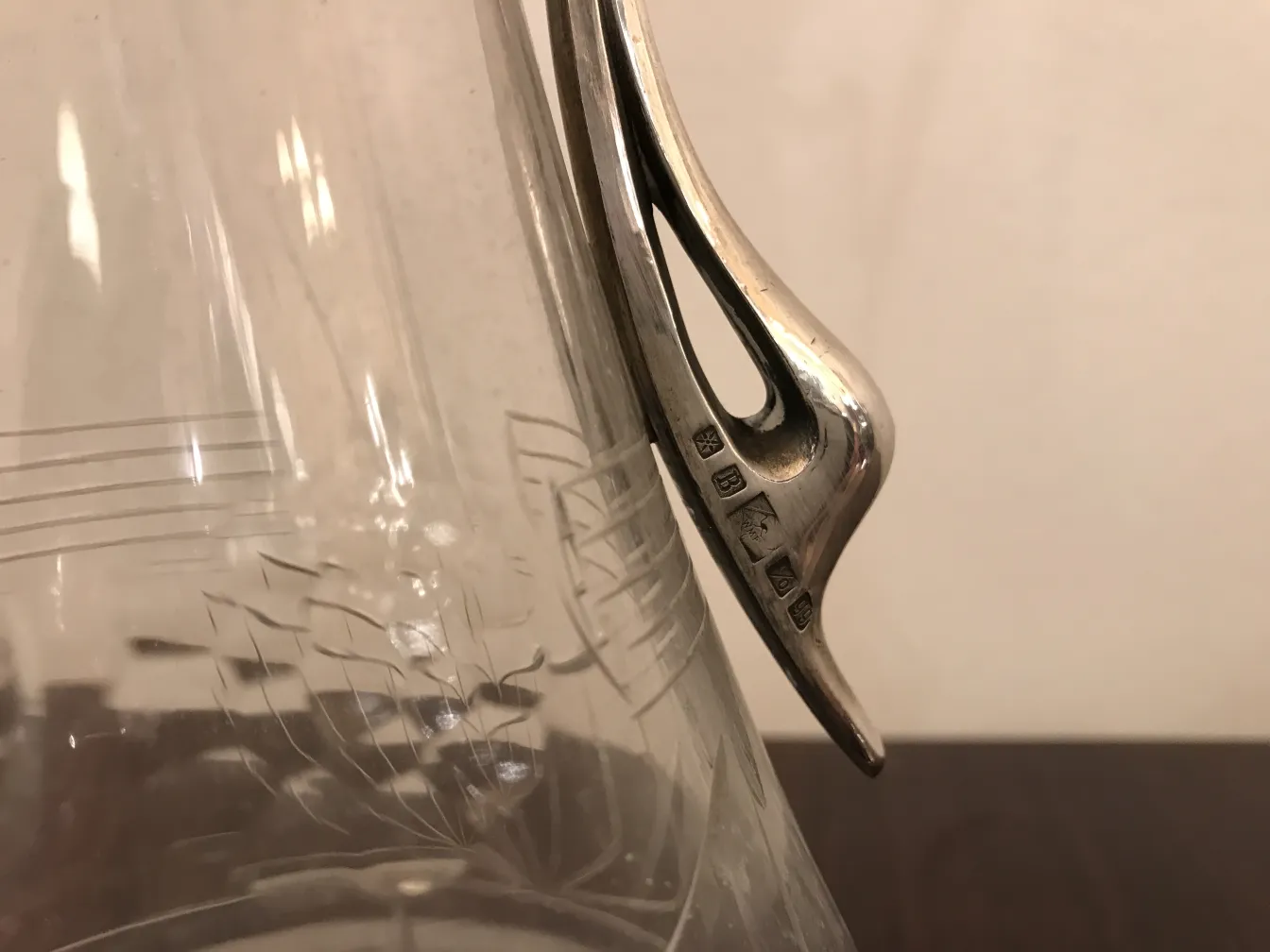 Antique jar with beautiful floral details in the design.