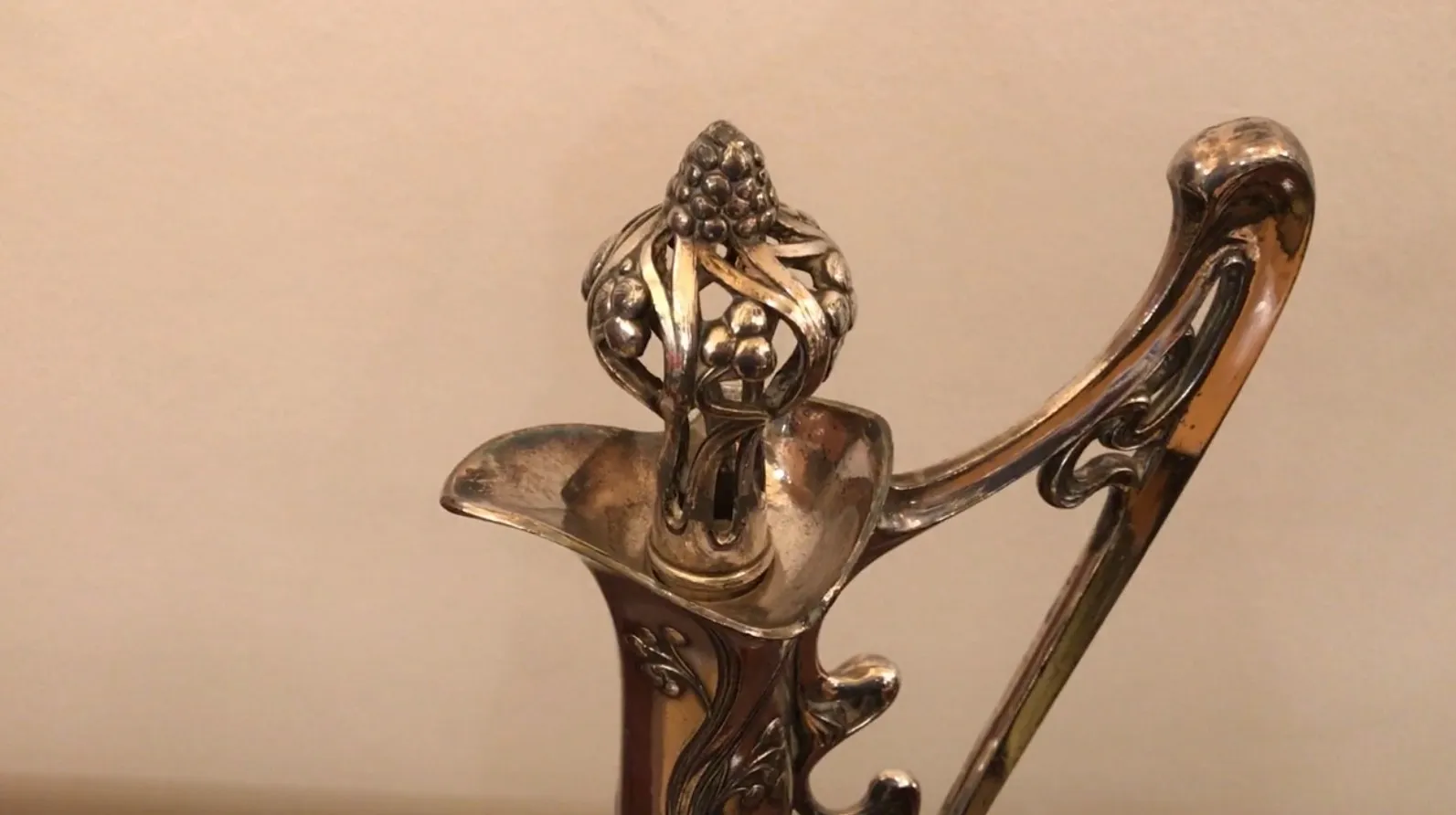 Antique jar with beautiful floral details in the design.