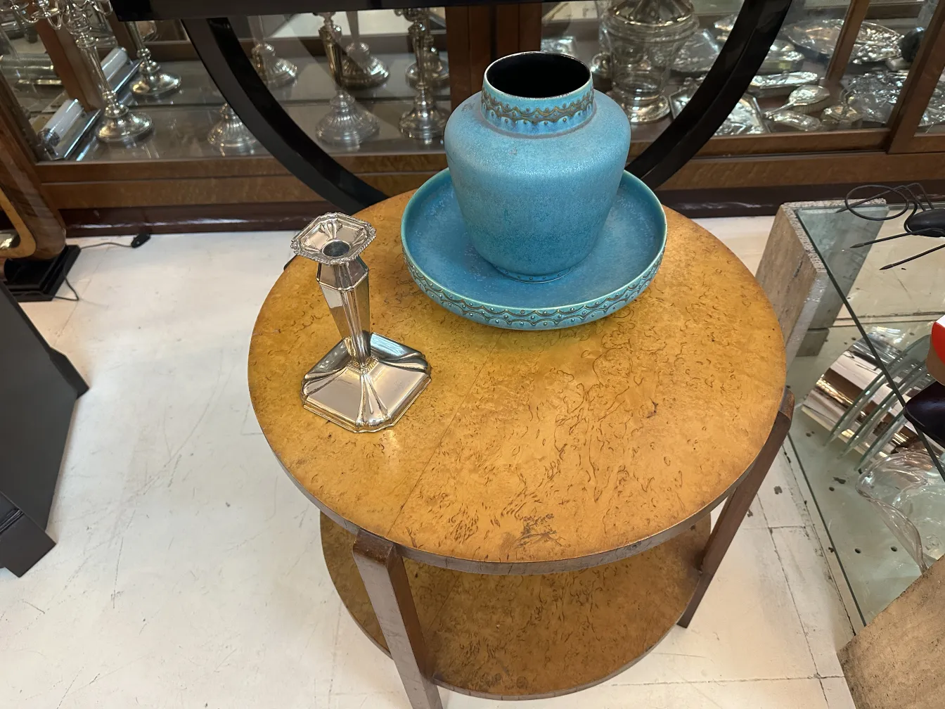 Antique decorative candelabra featuring elegant base and symmetrical design.