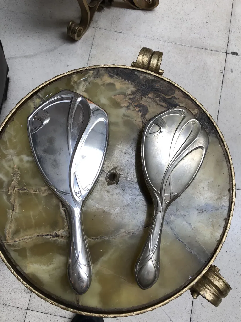 Antique hand mirror with an elegant design