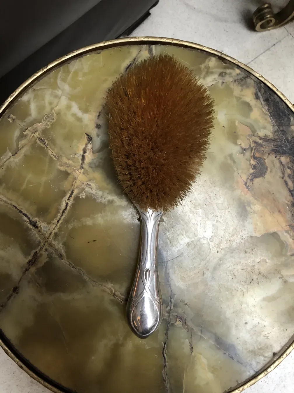Antique hand mirror with an elegant design