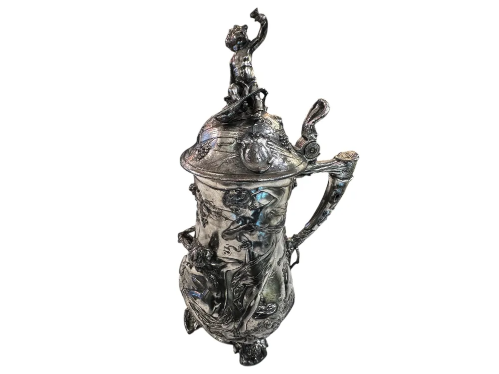 antique hot chocolate jug with decorative figures