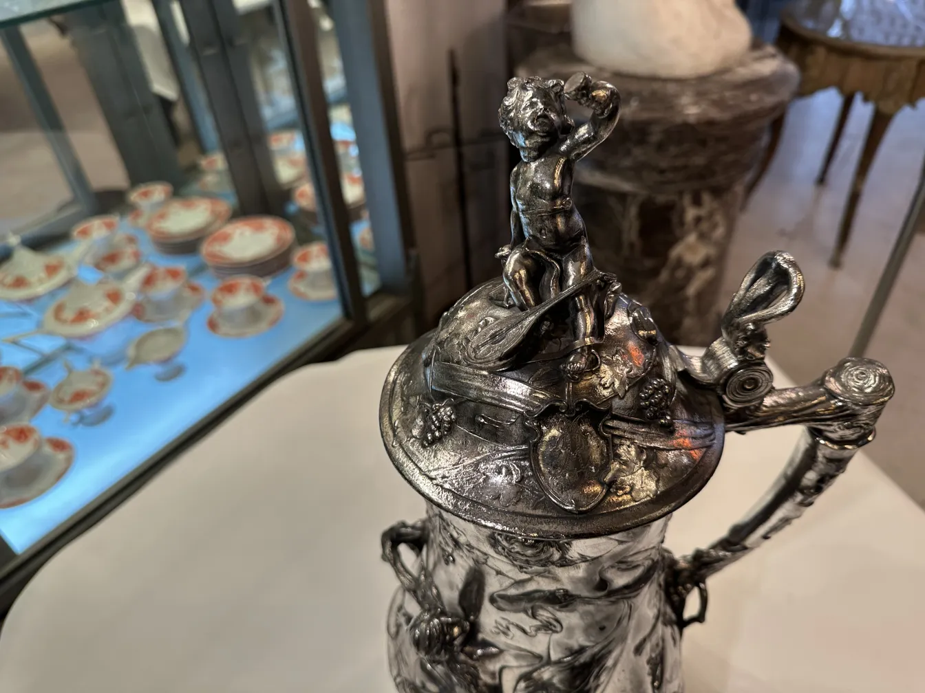 antique hot chocolate jug with decorative figures