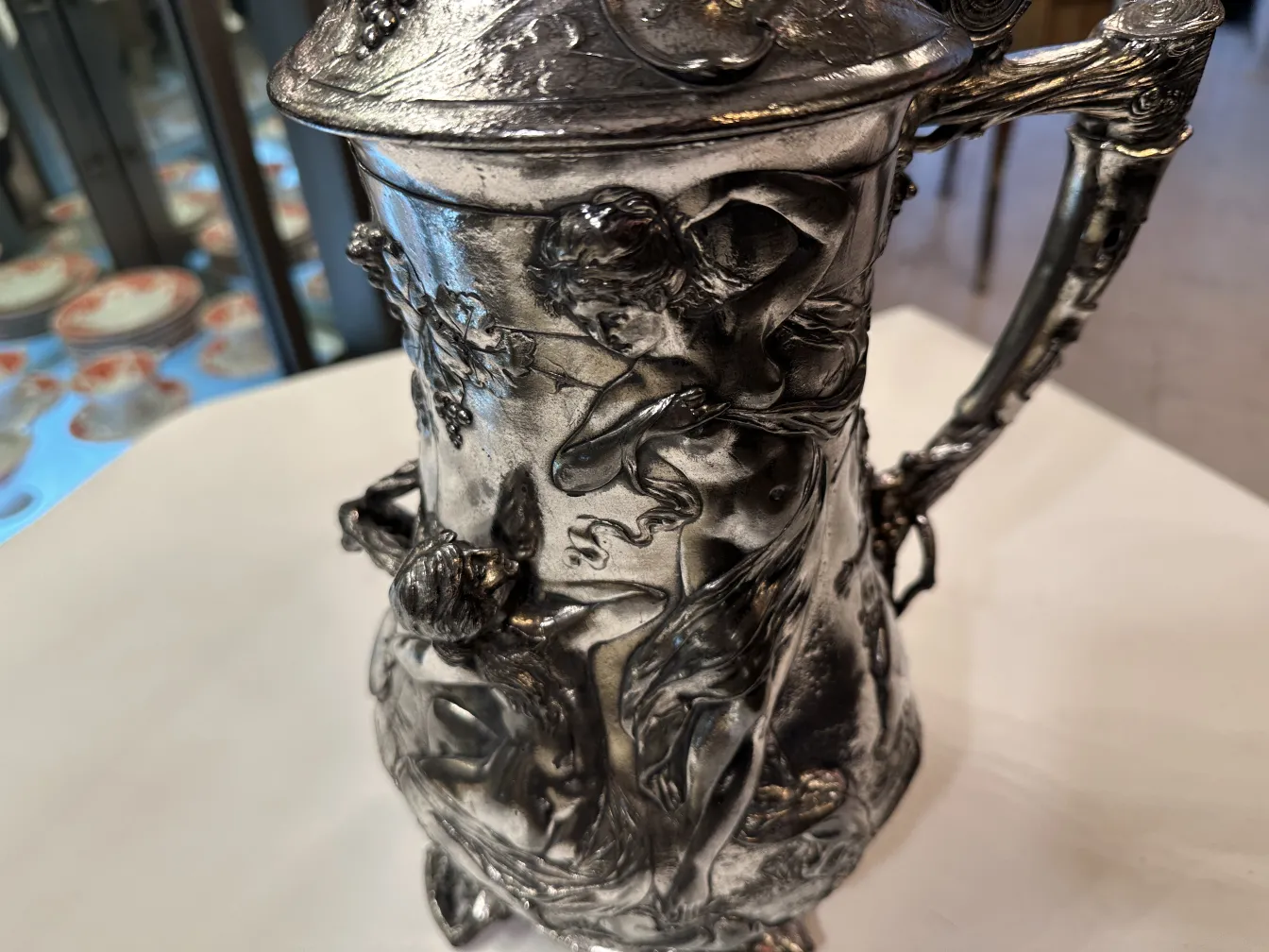 antique hot chocolate jug with decorative figures
