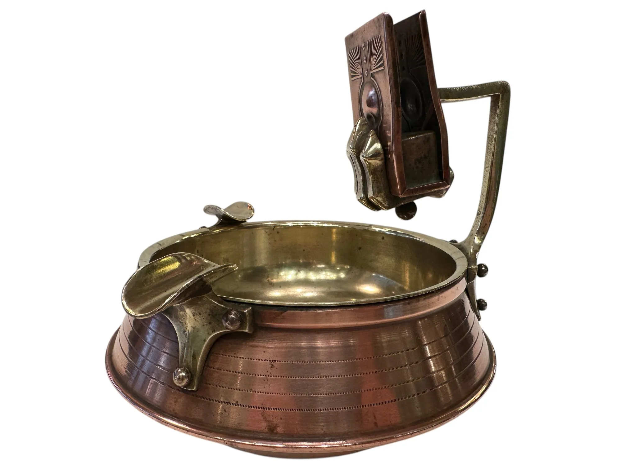 Antique metal ashtray with decorative design