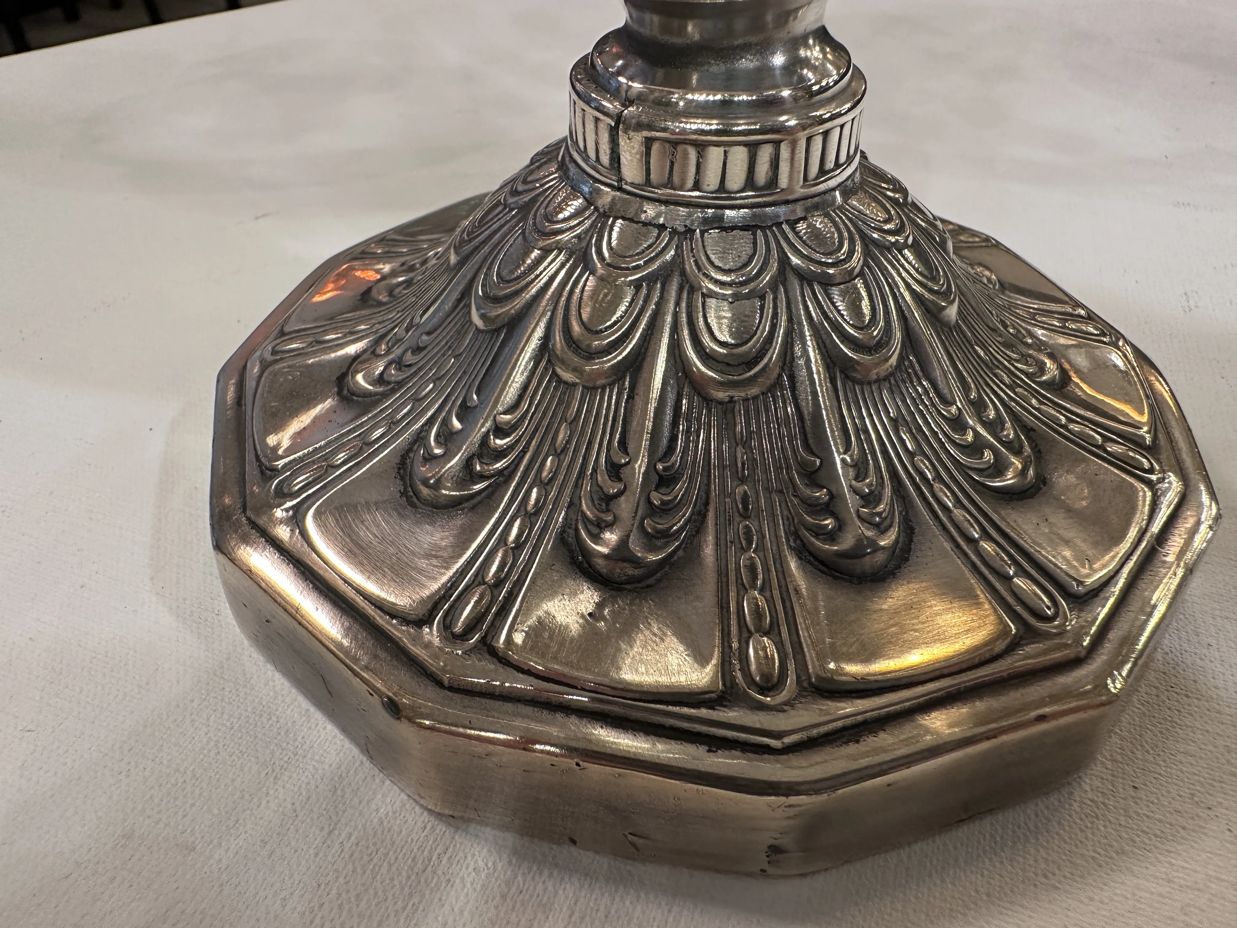 Shiny metal decorative base for antique candelabras