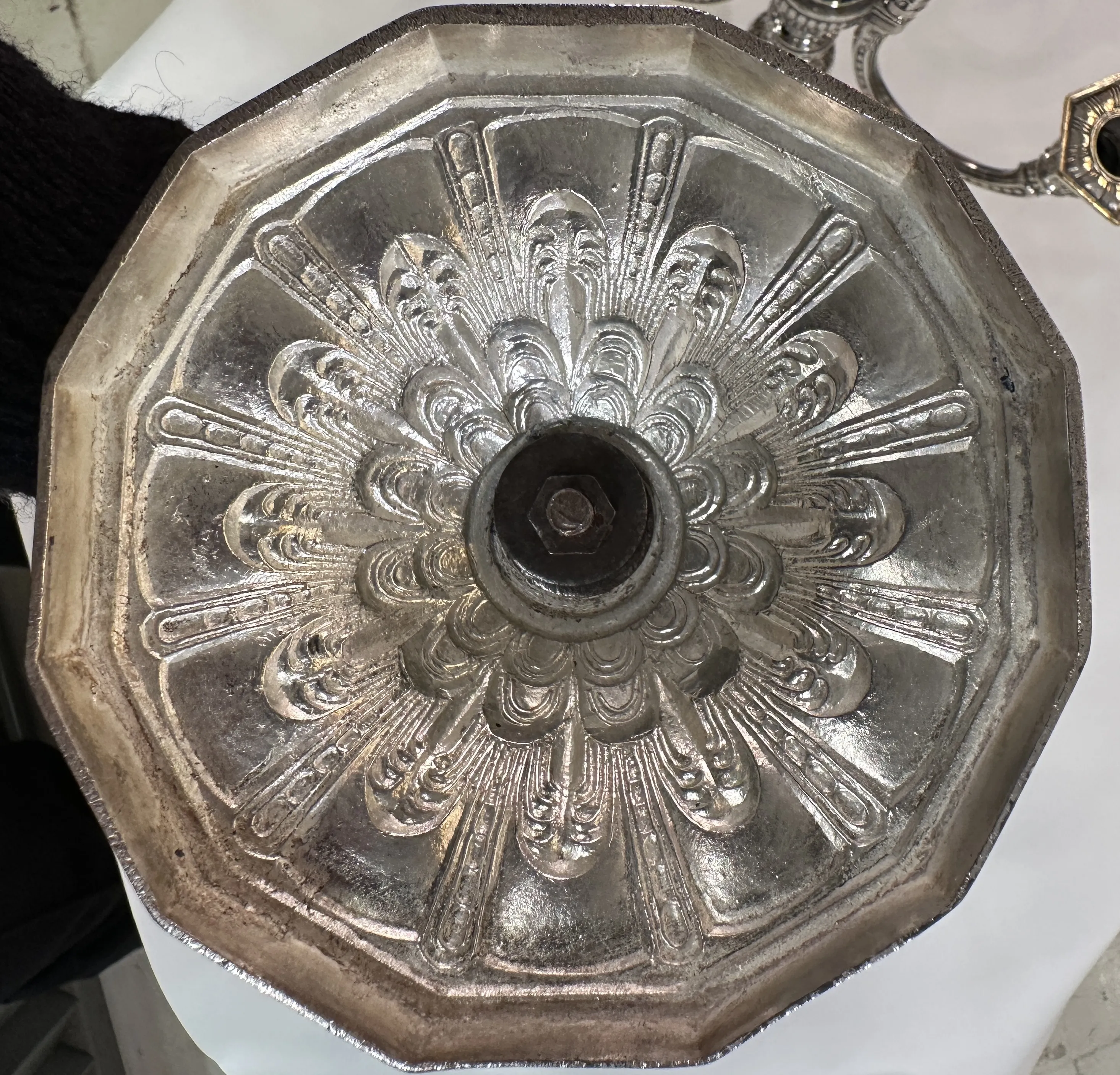 Top view of antique decorative candelabras with intricate design.