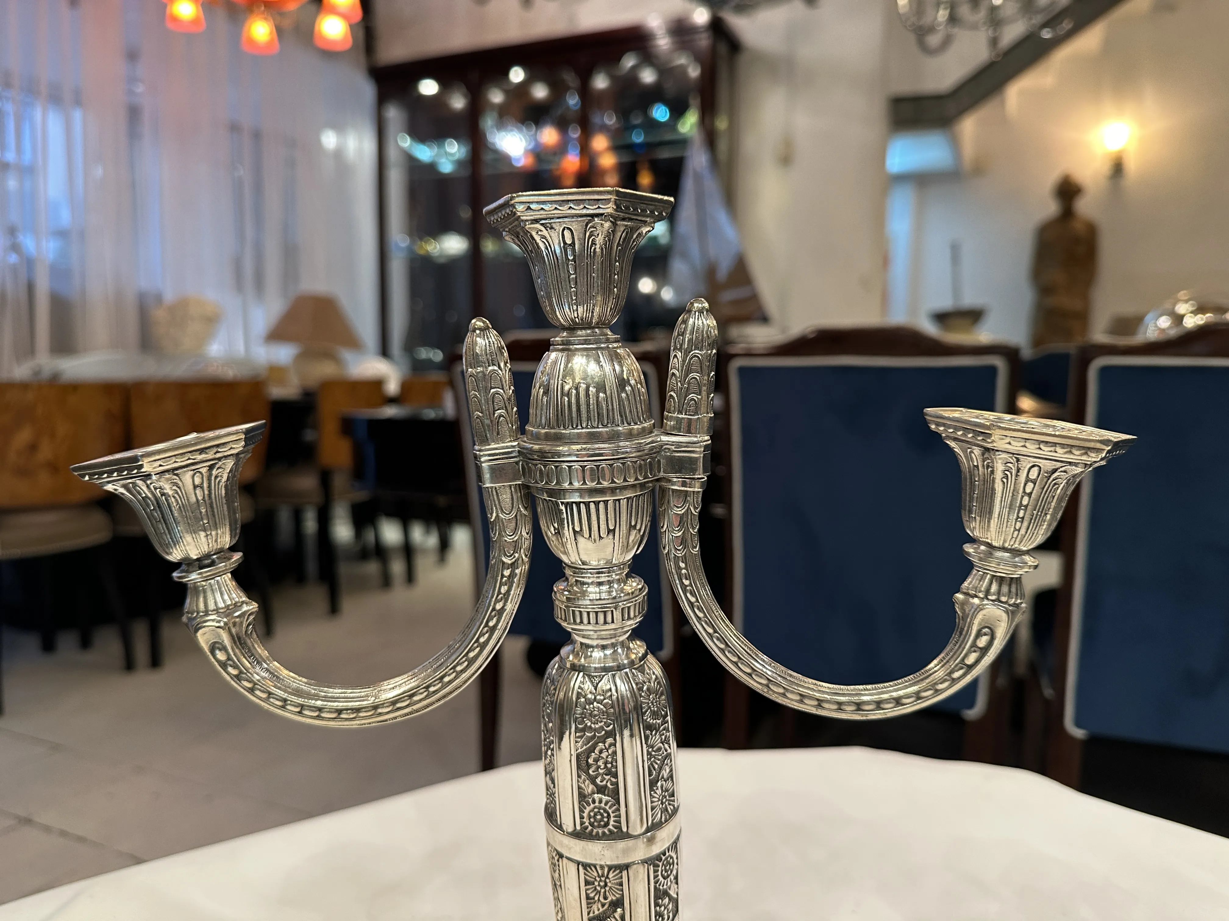 Antique candelabras set of 2 in an elegant background.