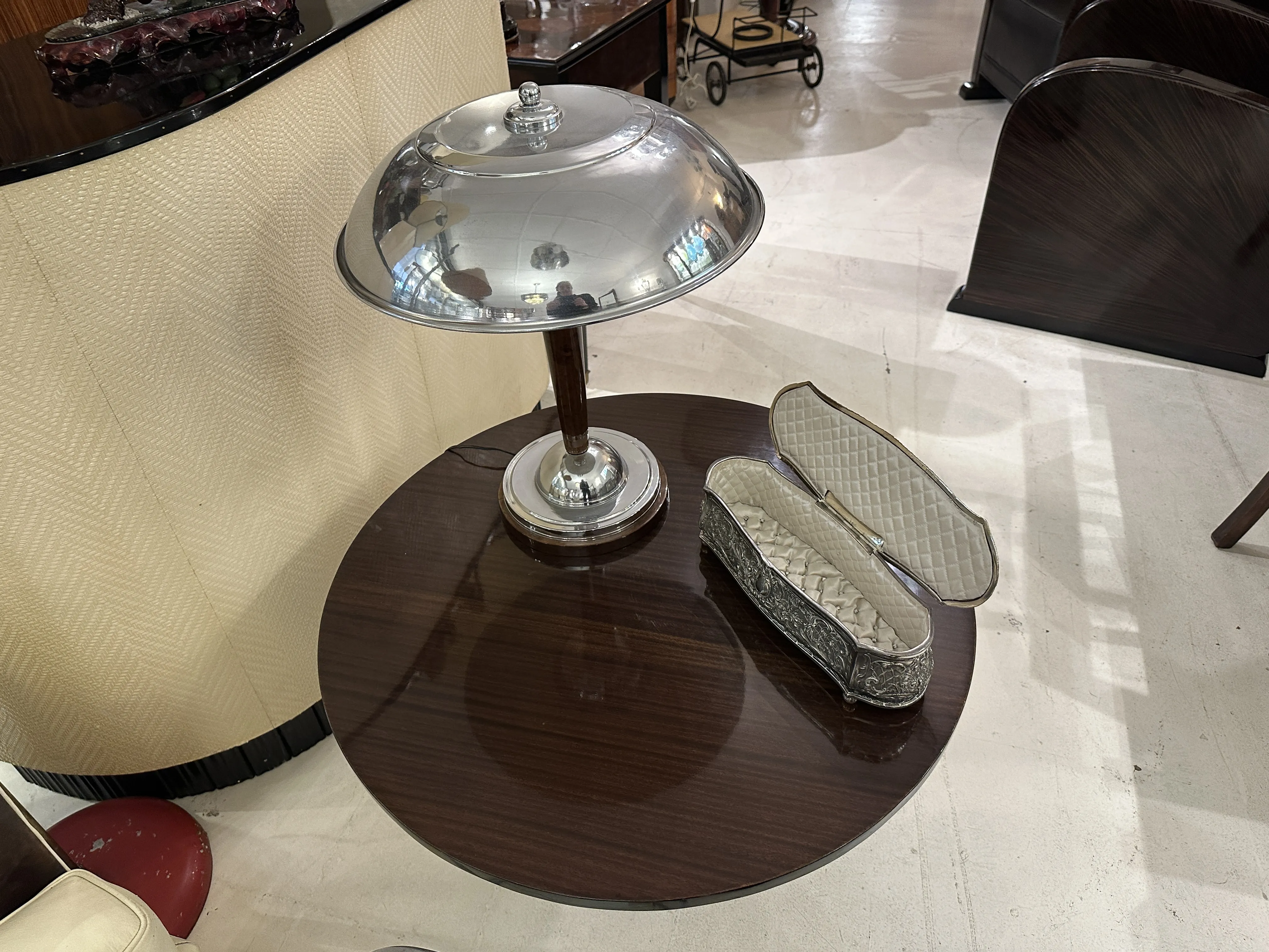 antique decorative box on a table with a lamp