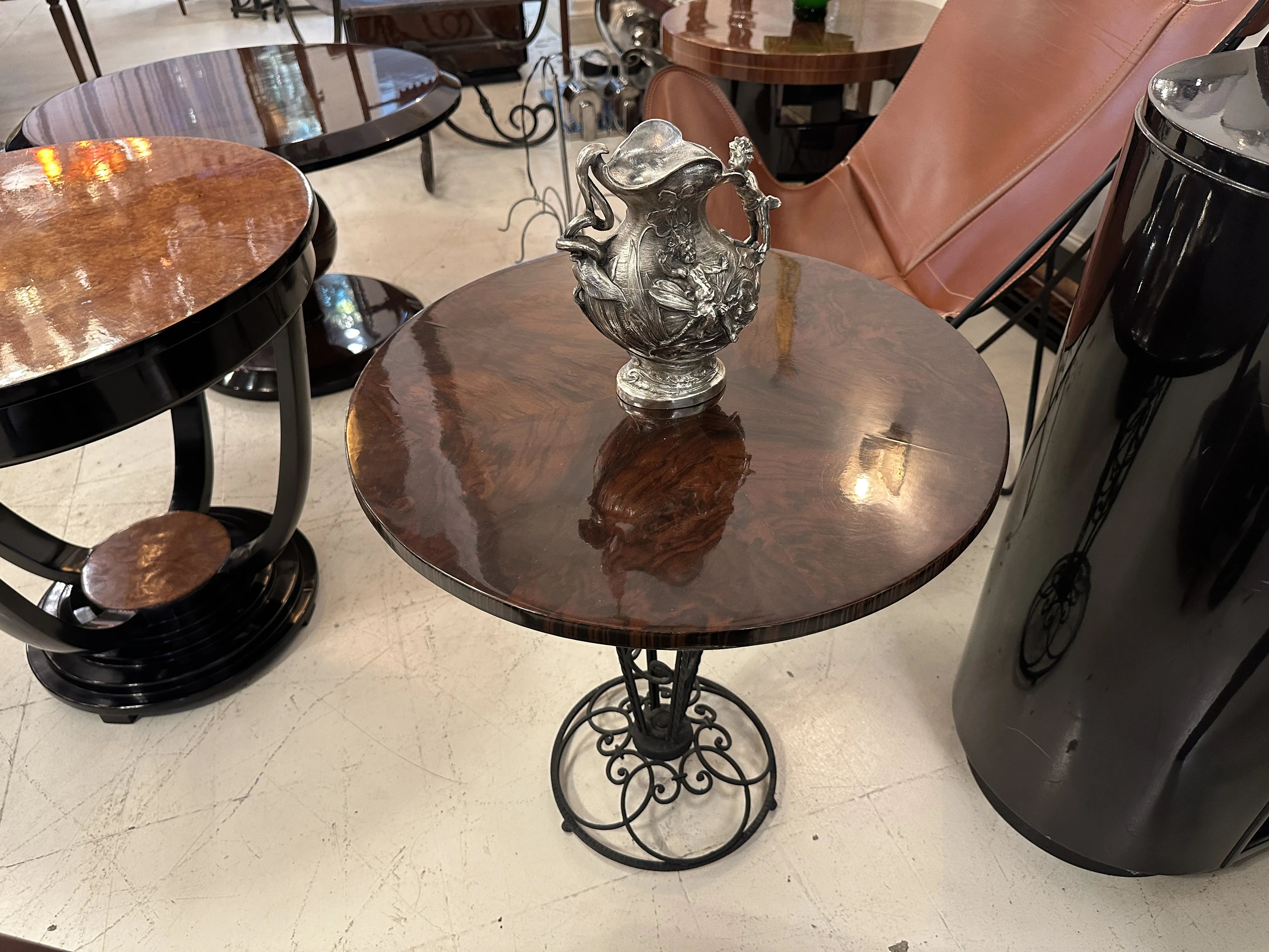 antique jar on a round mahogany table