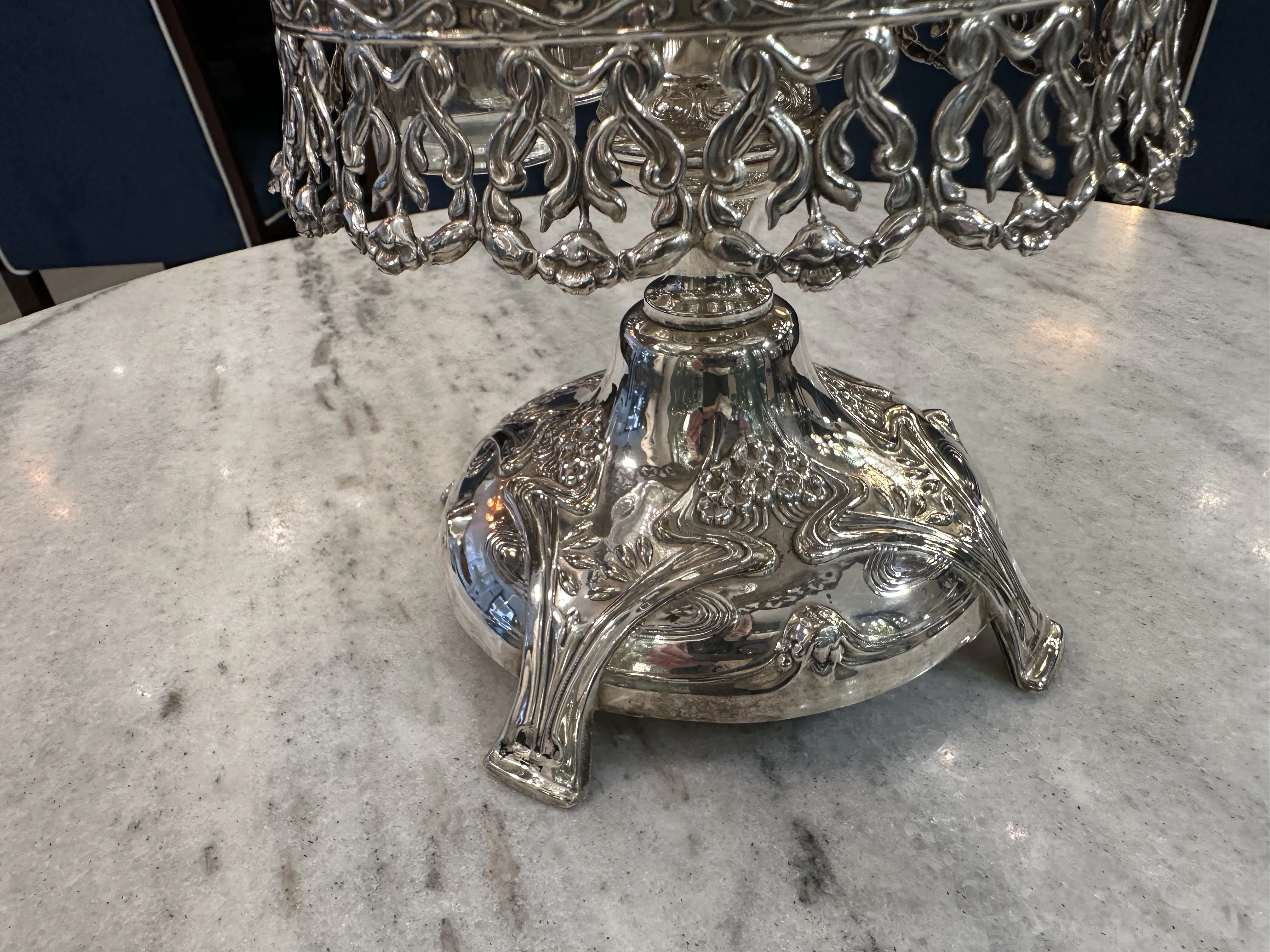 Antique salt and pepper shakers with decorative base, oil and vinegar.