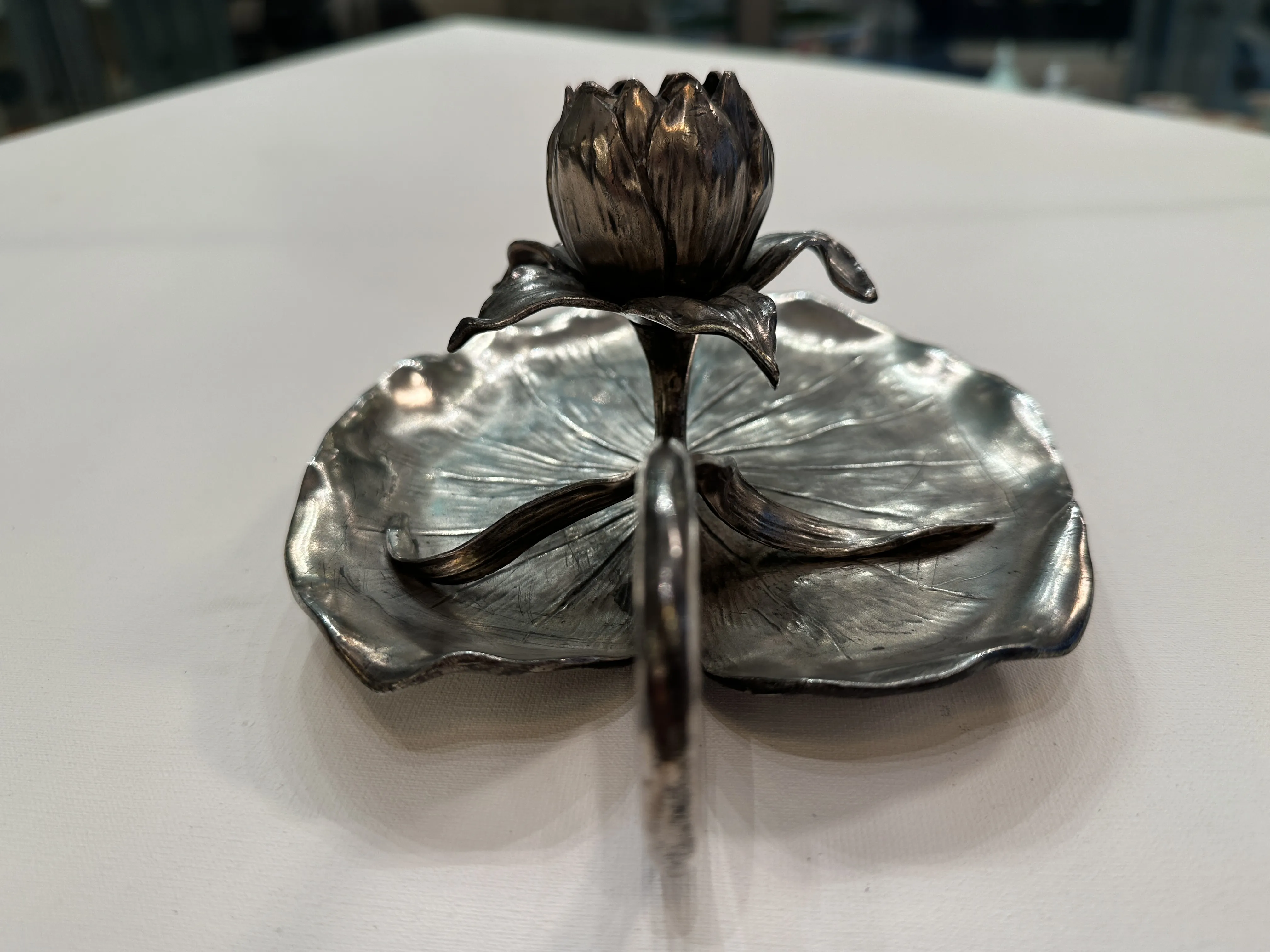 Decorative antique candelabra shaped like a flower