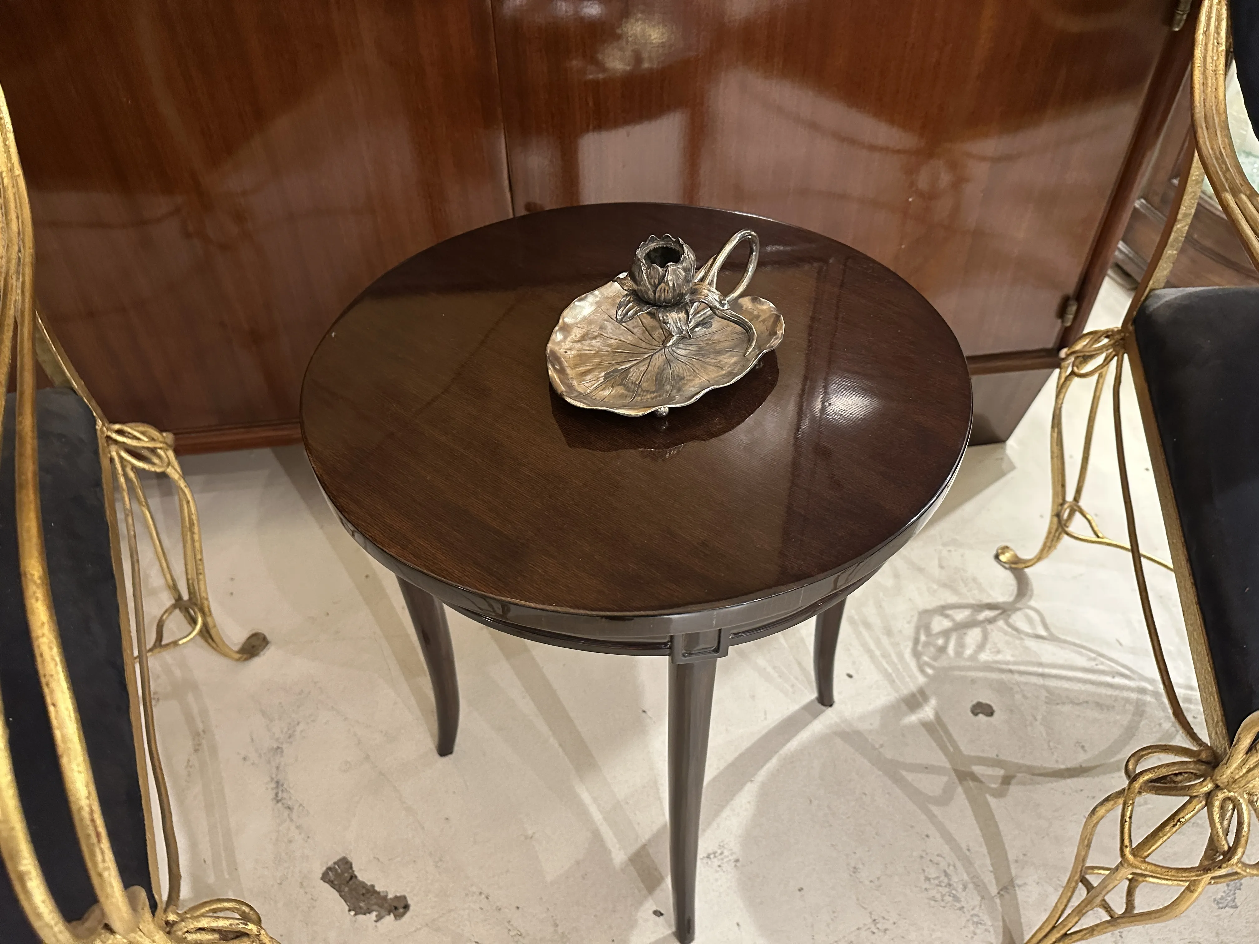 antique candelabra on a table with elegant decorations
