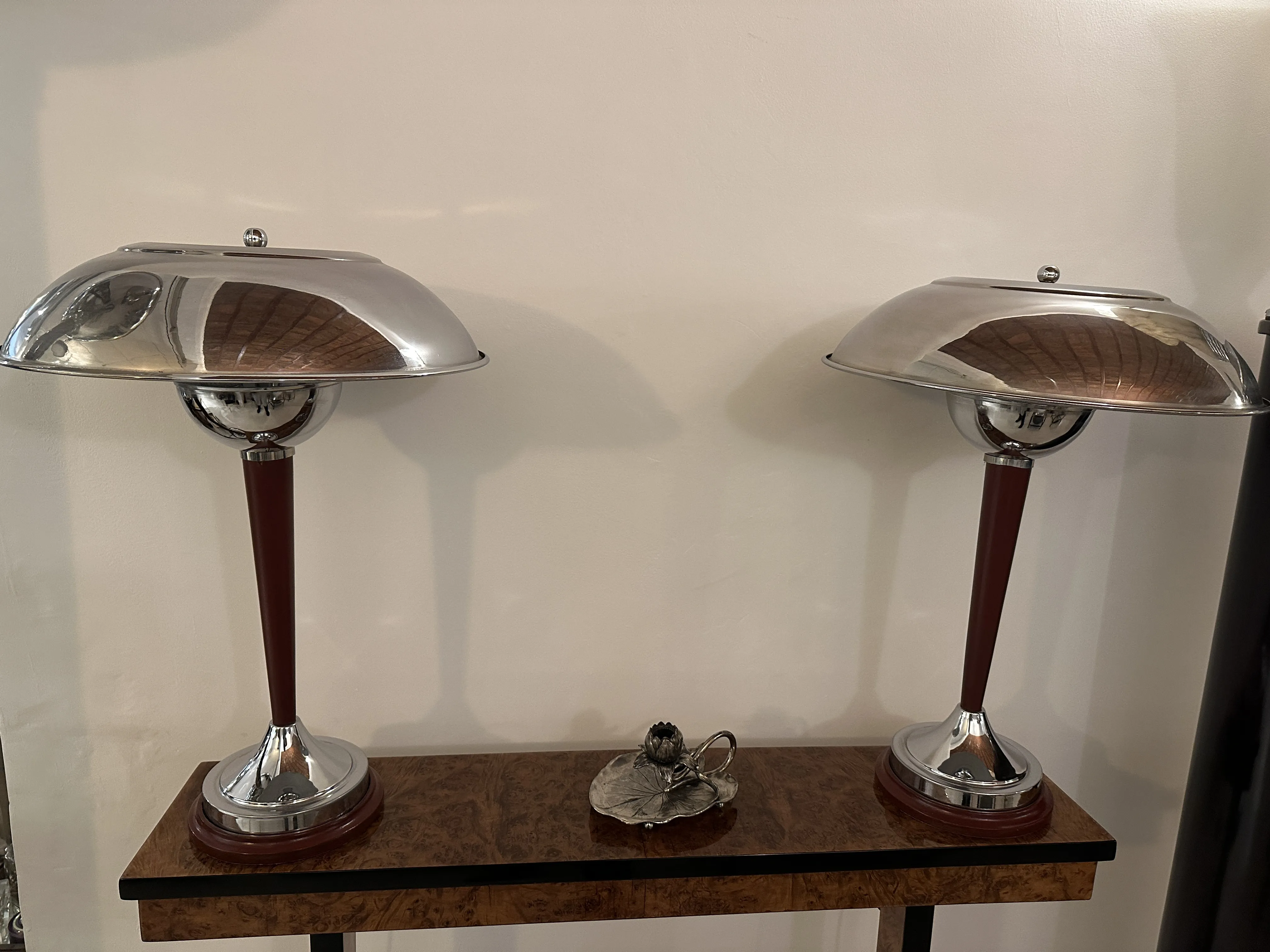 Antique candelabra featuring a stylish design and decorative base.