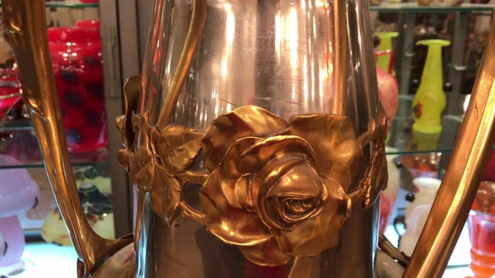 two antique vases with rose decorations