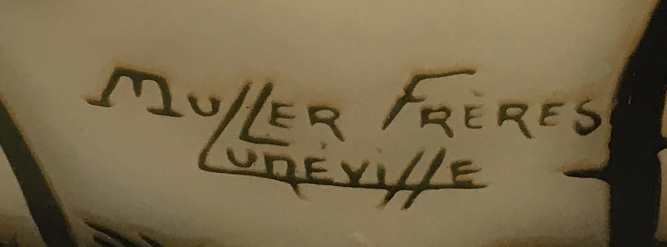 selo antigo Muller frères Lunèville com detalhes intrincados