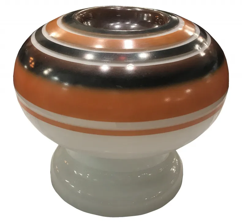 Antique table lamp featuring a round design with warm colors