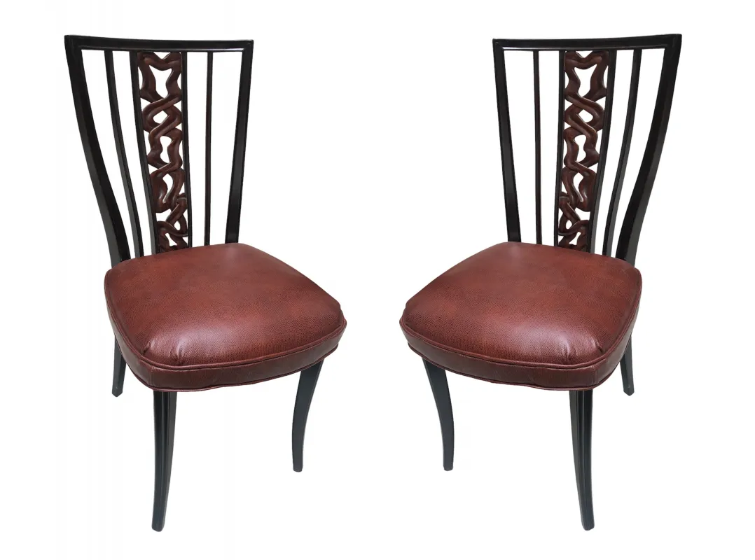 Front view of two antique chairs with brown cushions