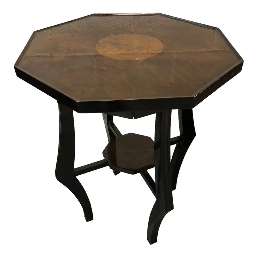 antique octagonal small table with subtle decorations in an elegant setting