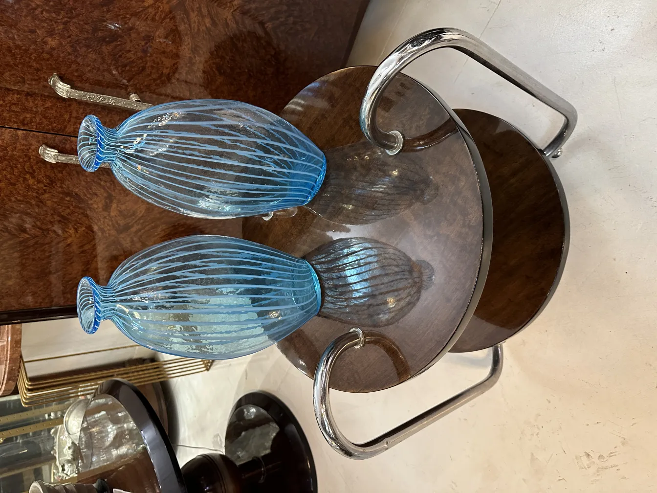 Two antique decorative blue vases on table