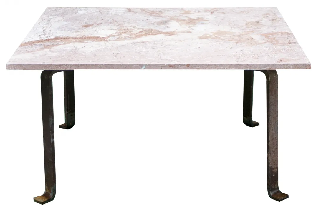 antique coffee table with a light surface and stylish legs