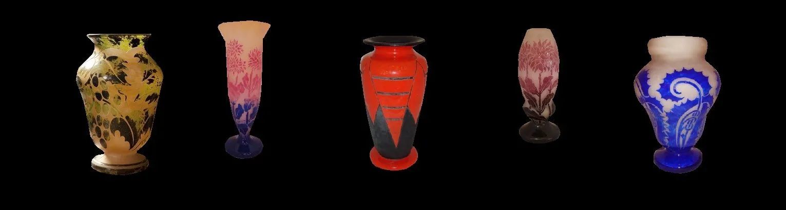 Antique French Degué vases with vibrant floral designs.