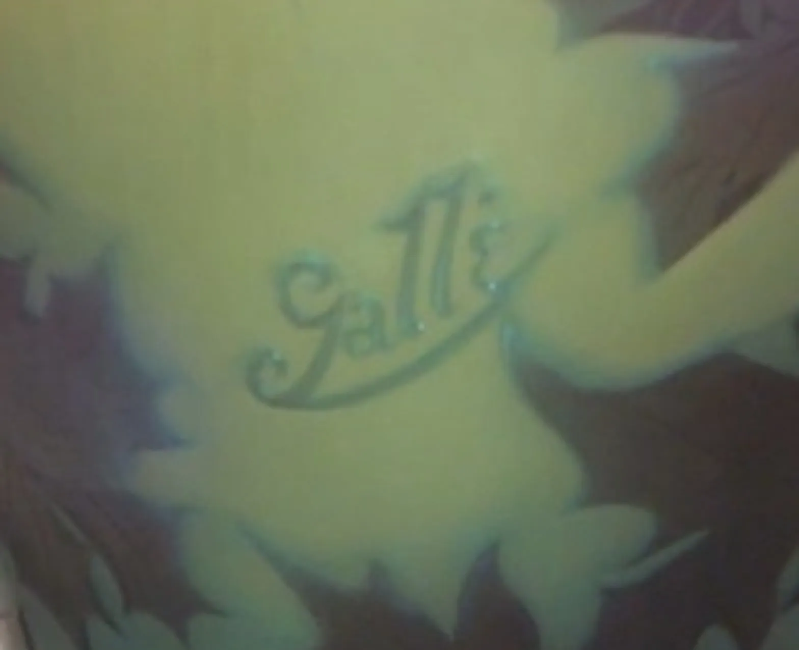 antique Gallé seal with floral design visible