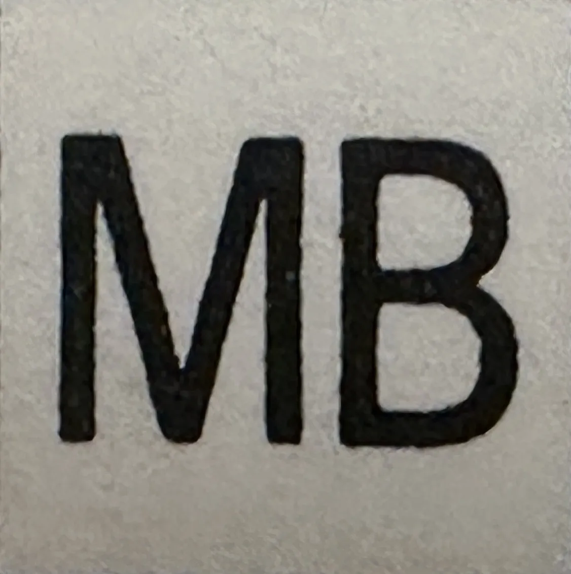 Antique seal with visible letters, from WMF.