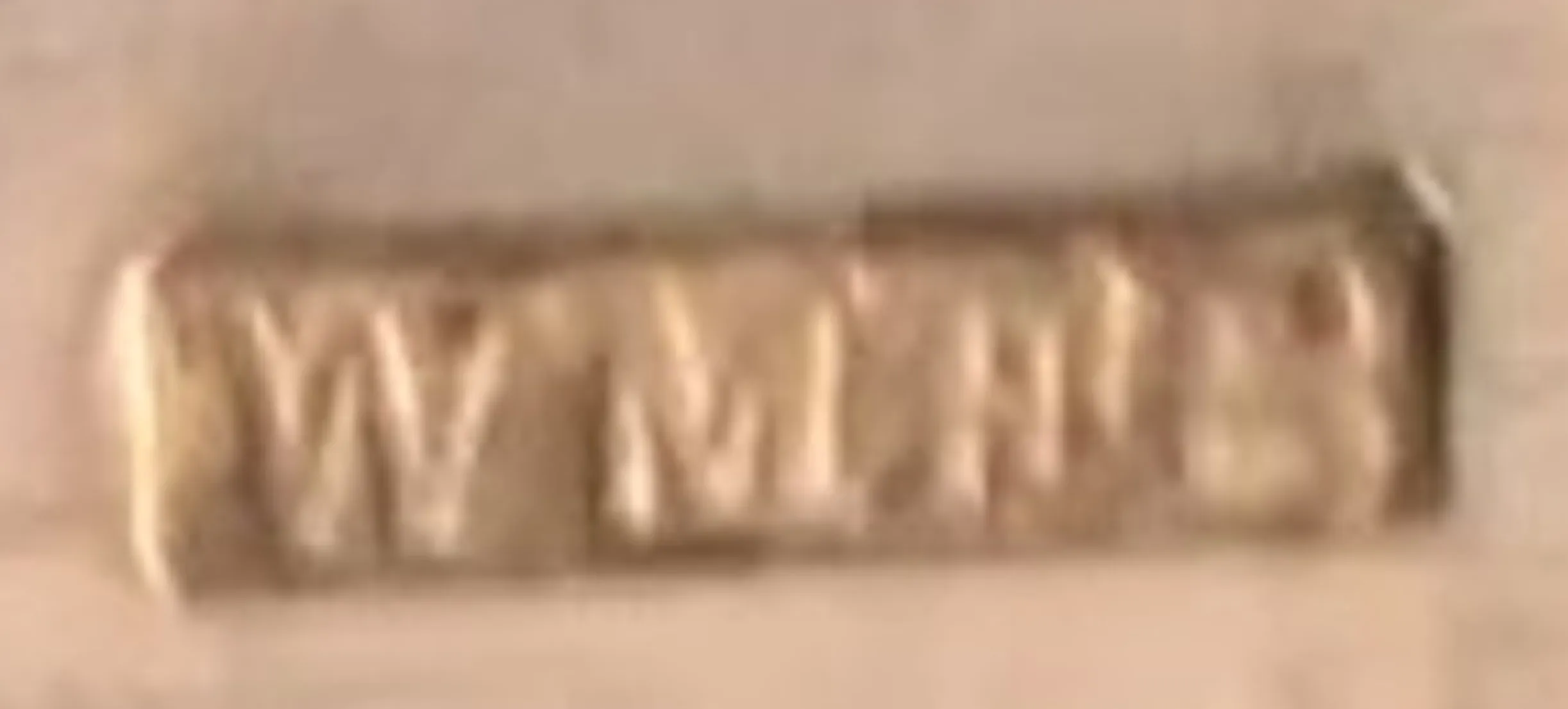 antique WMF seal, engraved, light background