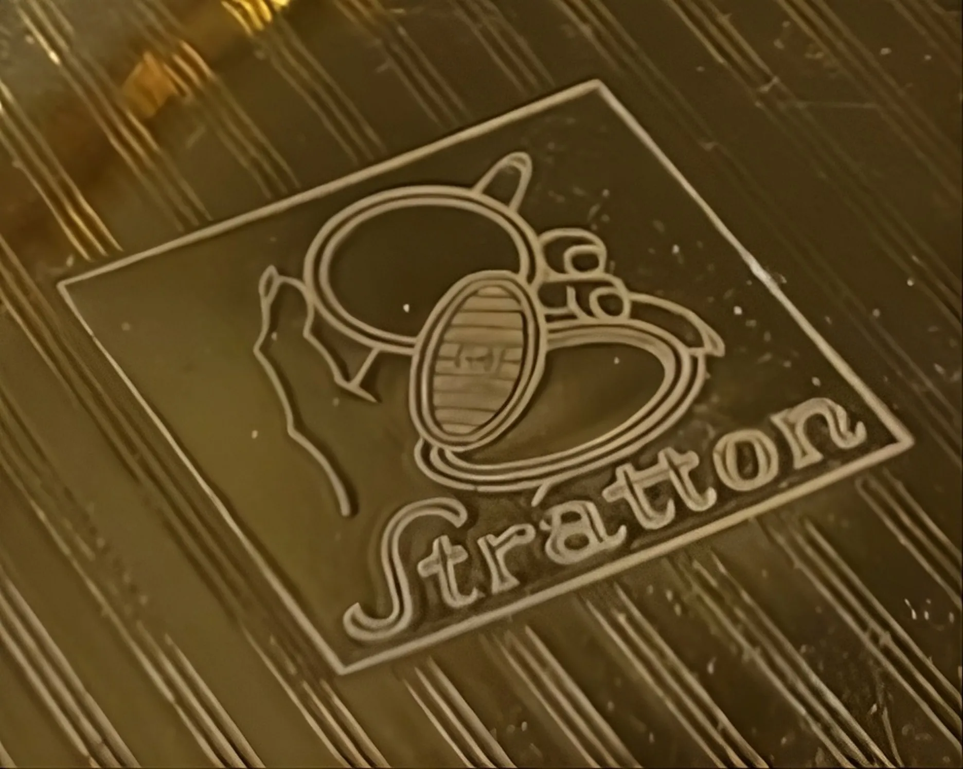 antique strátton seal with visible and stylized details