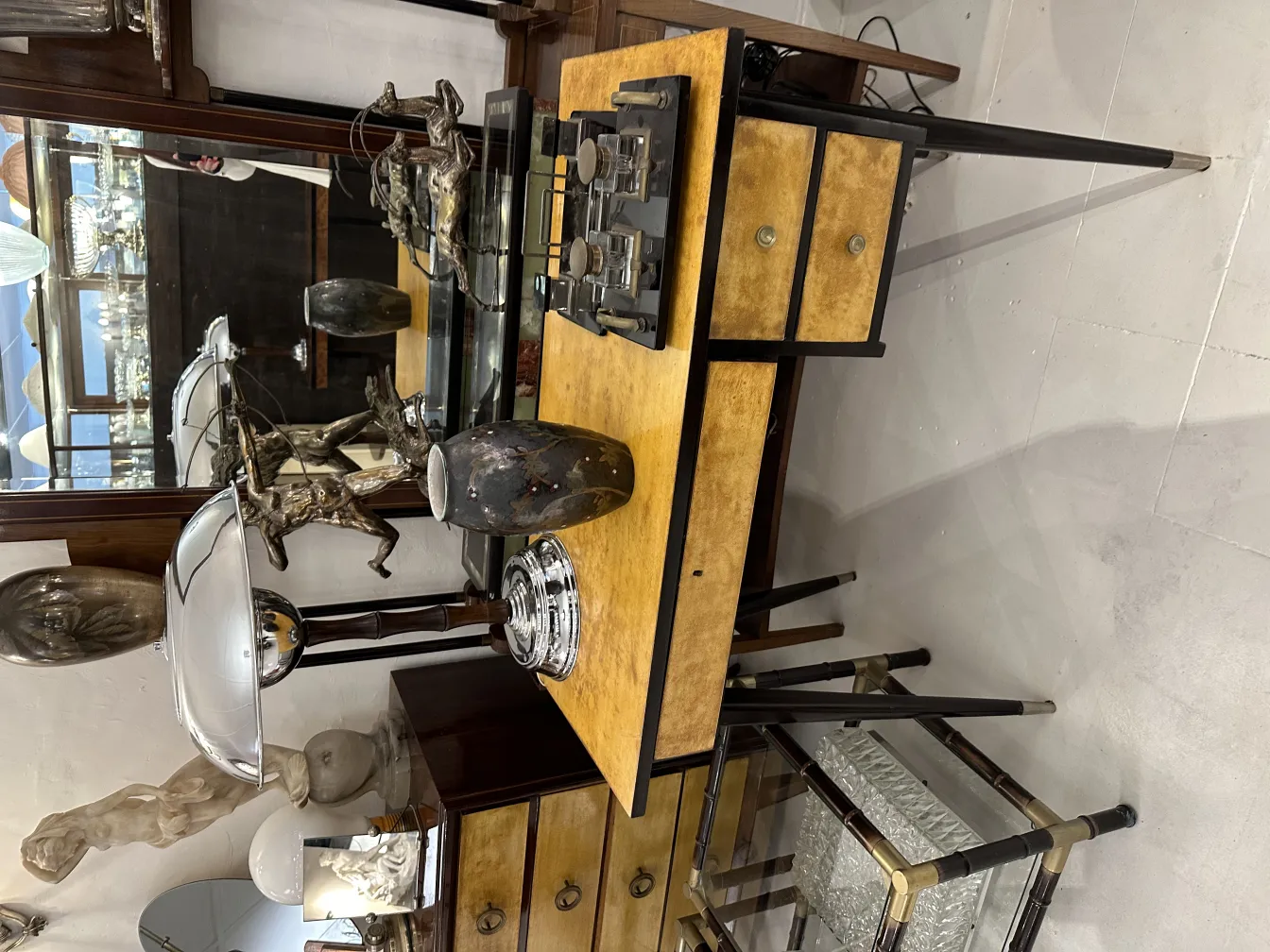 Antique decorative ceramic with metallic details in an elegant setting.