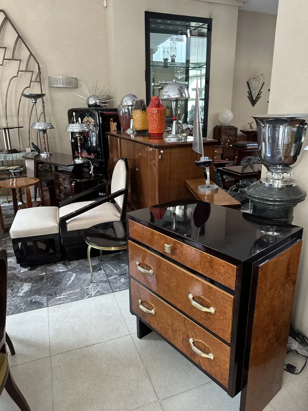 Antique cabinet of wood with shiny handles