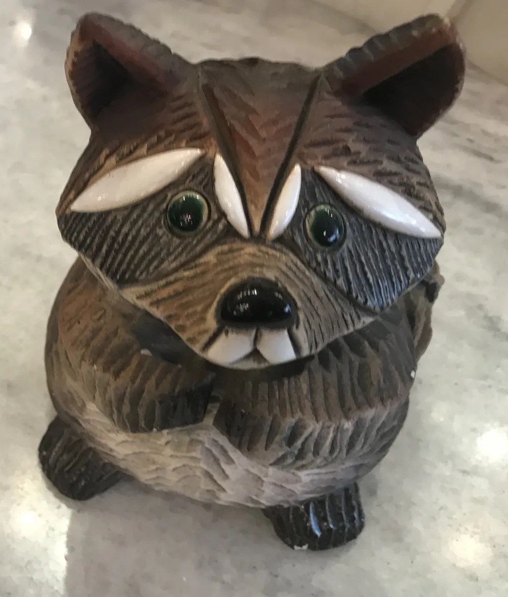Antique ceramic figure, fox sculpture with intricate details.